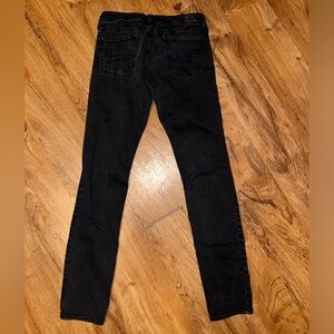 Women’s black American Eagle skinny jeans; super stretch;  size 8